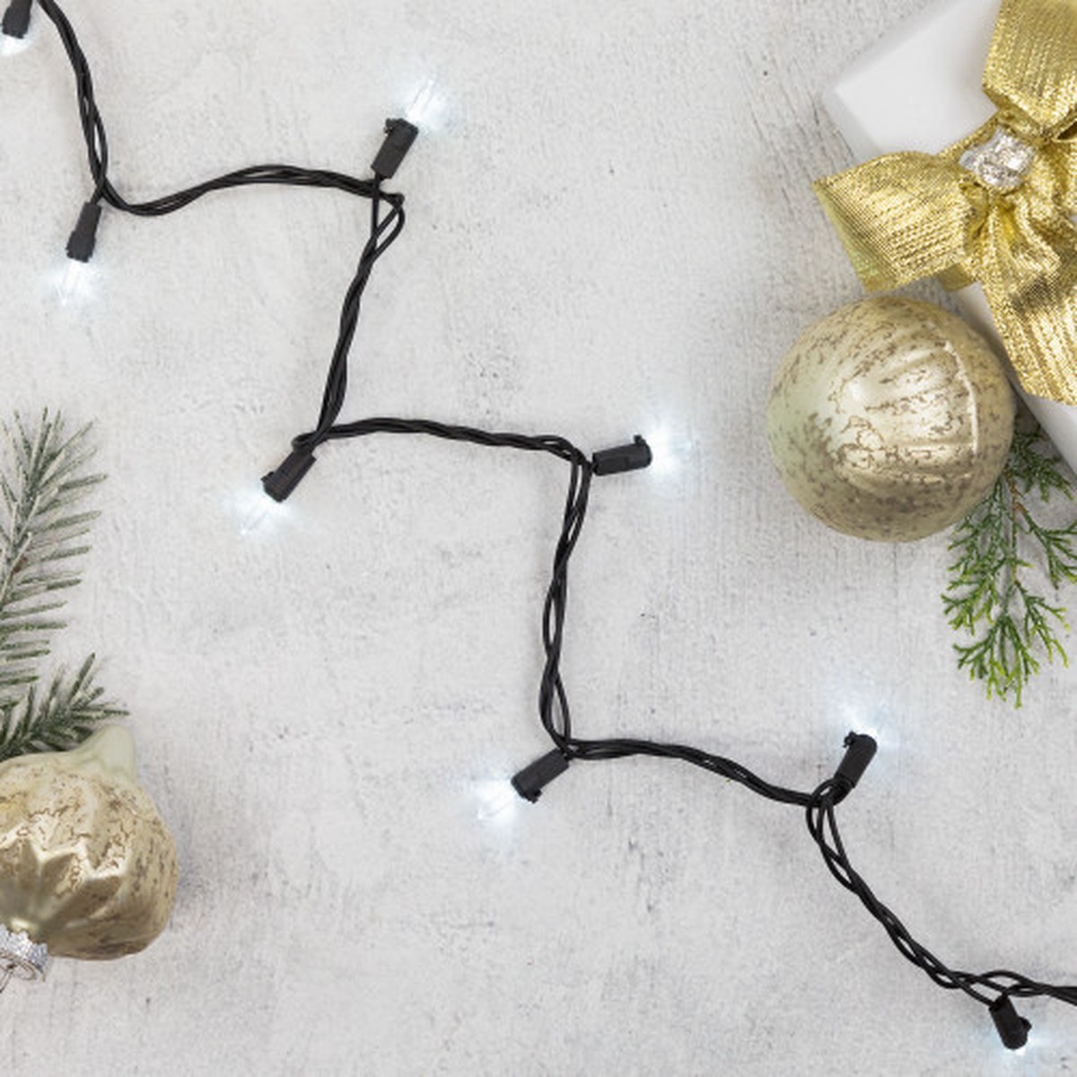 Pure White LED Mini Christmas Lights - 4" Spacing - Black Wire - 100ct