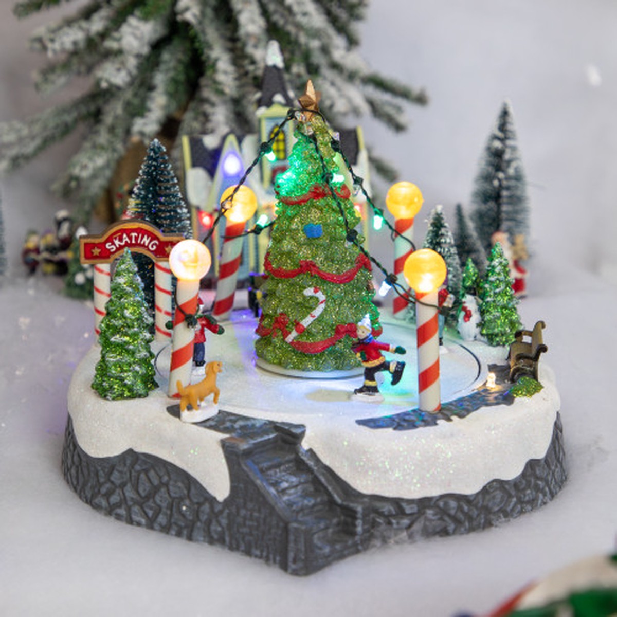 Animated and Musical Ice Skaters Christmas Scene LED Lighted Village Display – 9″